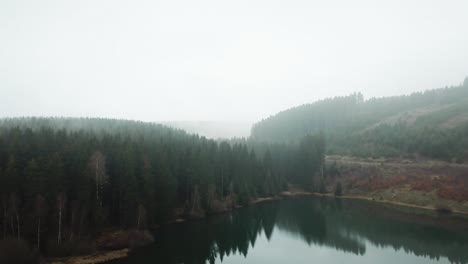 Drone-shot-of-a-foggy-lake-in-4K