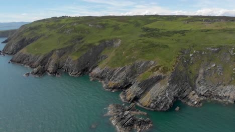 Flying-towards-the-rocky-green-irish-cliffs-by-the-sesa