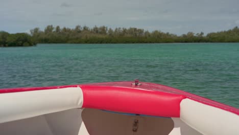 Slow-motion-shot-of-speed-boat-in-crystal-blue-water