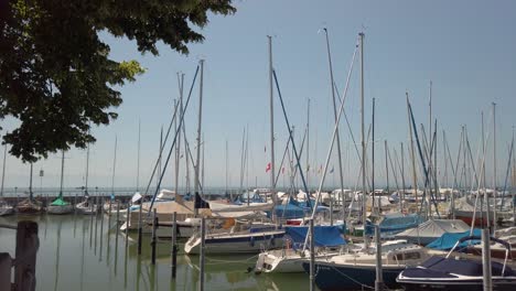 Marine-Harbor-with-luxury-sailboats-docked-in-Switzerland-Zurich-next-to-the-city