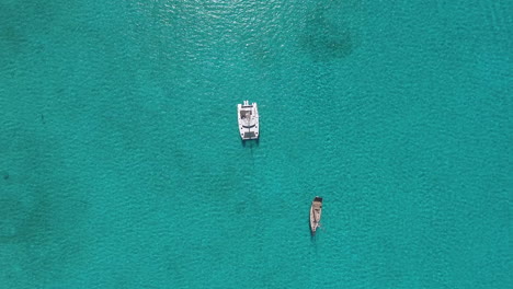 Aerial-top-down-view-of-a-big-white-catamaran-yacht-boat
