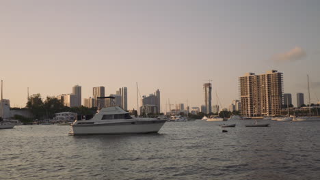 Yachts-and-boats-in-front-of-Miami-skyline-at-sunset