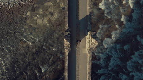 4K-Symmetric-Zenithal-Aerial-Drone-view-of-historical-old-stone-bridge