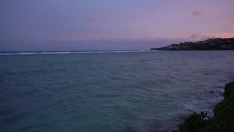 Stunning-sunset-over-ocean-coast-and-tropical-beach