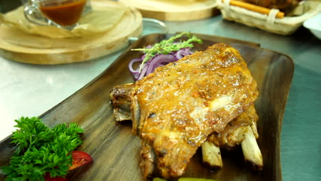 Putting-ribs-on-wooden-board