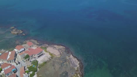 Aerial-tilt-up-view-of-Tabakaria-at-Chalepa-in-Chania,-Crete,-Greece