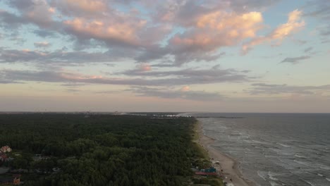 Drone-aerial-view-of-Baltic-sea-coast,-Klaipeda,-Lithuania