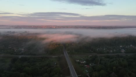 Drone-aerial-view-of-fog-over-the-forest