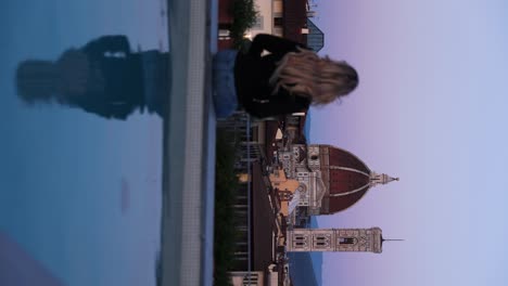 Young-Woman-Tourist-Admiring-Florence-Cathedral-while-on-Italy-Vacation,-Vertical-Footage