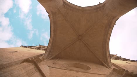 Upward-circling-shot-of-arch-of-Montpellier-Cathedral-main-entrance