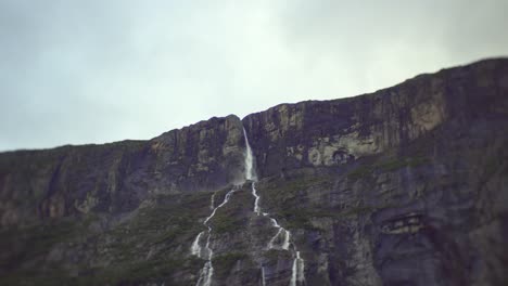 Huge,-Beautiful-waterfall-coming-down-a-big-mountain-in-Norway,-Europe