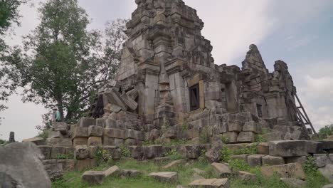 Woman-exploring-visiting-Ek-Phnom-temple-near-Battambang-in-Cambodia