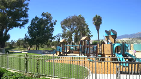 An-empty-playground-for-children-in-the-middle-of-a-park-near-the-beach-on-a-sunny-day-in-Santa-Barbara,-California