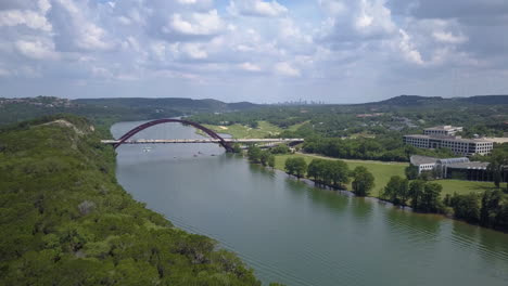 Wide-aerial-view-of-Pennyback-bridge-with-downtown-Austin,-Texas-in-the-background
