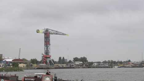 The-famous-hotel-crane-called-the-Fallada-at-the-NDSM-Wharf,-an-icon-of-the-new-Amsteram-area