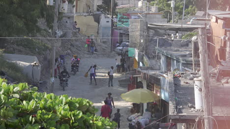 People-walking-down-neighborhood-road-in-Petion-ville-neighborhood