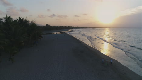 AERIAL:-Sunset-on-Honduran-beach---Tela,-Honduras-2