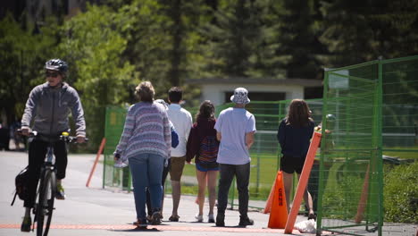 Happy-family-walking-on-a-pedestrian-path