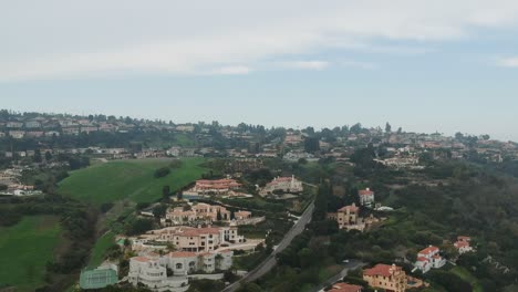 Midday-drone-view-and-moving-forward-above-the-Pales-Verdes-Estates-golf-club,-California