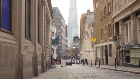 Romantic-view-from-a-historic-London-street-towards-a-modern-skyscraper