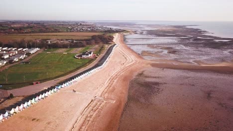 Drone-footage-showing-beach-huts-from-above-in-the-UK