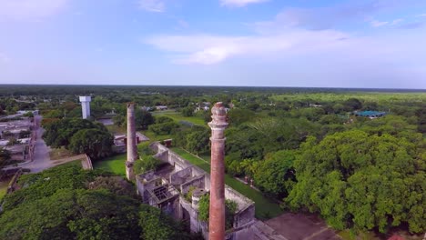 Aerial-view-with-drone-of-the-San-Pedro-Chimay-farm-in-ruins,-which-had-2-chimneys-in-Yucatan