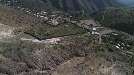 Aerial-shot-of-a-graveyard-and-a-Church-in-Real-de-Catorce,-San-Luis-Potosi-Mexico