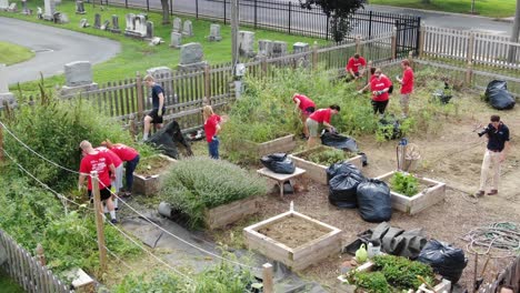 Volunteers-of-United-Way-of-Lancaster-County-at-charitable-community-work-cleaning-up-a-small-garden