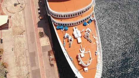 Revealing-rocket-aerial-of-the-bow-of-a-ship-docked-in-the-harbour