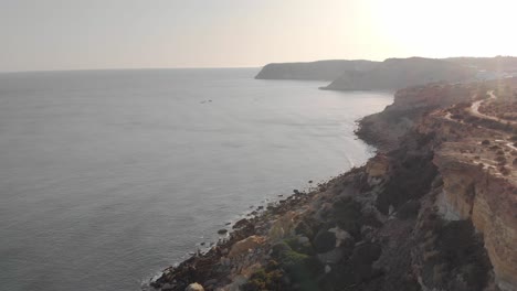 Aerial-footage-of-the-cliffs-in-Burgau,-Lagos,-Portugal