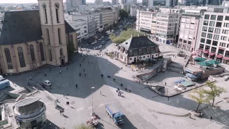 Static-shot-of-konstablerwache,-Zeil,-centre,-downtown-at-daylight-with-people-walking,-aerial-view,-Frankfurt,-hessen,-germany