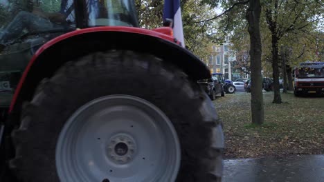 Tractor-driving-in-frame-during-the-farmers-protest-in-The-Netherlands-against-the-European-nitrogen-emission-regulation