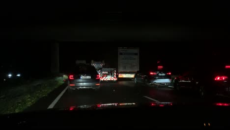 Construction-vehicle-driving-on-centre-strip-of-freeway