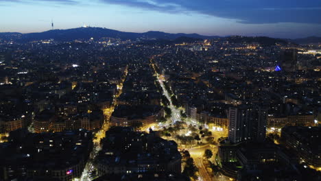 Aerial-view-of-Barcelona-at-sunrise,-Spain