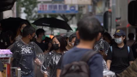 Foto-De-Teleobjetivo-De-Manifestantes-De-Hong-Kong-Caminando-Hacia-La-Cámara