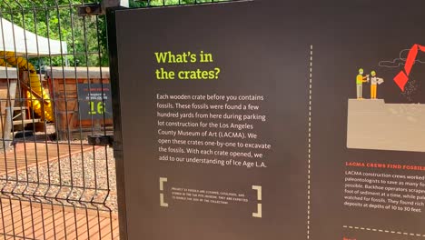 Large-wooden-fossil-crates-at-the-La-Brea-Tar-Pits-excavation-site-where-Paleontologists-continue-to-excavate,-clean,-examine,-and-provide-new-data-artifacts-for-the-museum