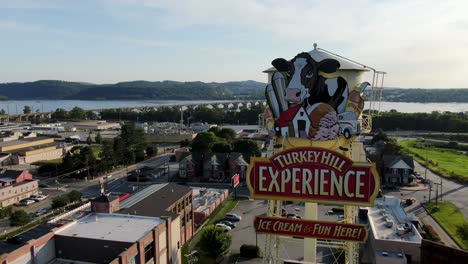 Slow-aerial-showing-Turkey-Hill-billboard-and-Columbia-Borough-in-Lancaster-County,-PA