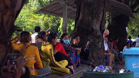 People-Sitting-and-Waiting-in-an-Outdoor-Seating-Area