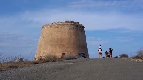 Children-and-parents-at-Torre-de-Mesa-Roldan-in-Ameria,Spain