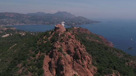 Aerial-view-of-building-on-a-hill-overlooking-the-beautiful-French-Riviera-near-Cannes,-France