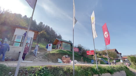 Wide-gimbal-shot-shows-entry-area-and-tourist-information-of-excavations-at-the-Bosnian-pyramid-of-sun,-near-Visoko-in-bosnia-and-Herzegovina