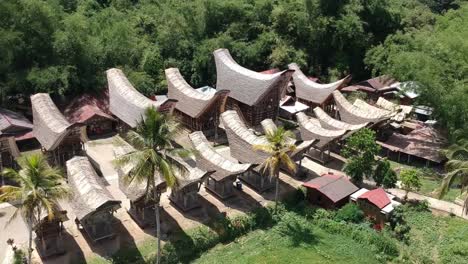 Aerial-over-Tongkonan-House,-traditional-house-for-toraja-people-Indonesia