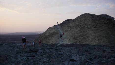 Hikers-going-down-after-reaching-the-crater-of-Dallol-volcano-in-Ethiopia