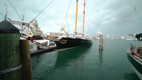 Wide-Shot-of-Classic-Clipper-Ship-on-Beautiful-Calm-Water-Docked-at-Marina