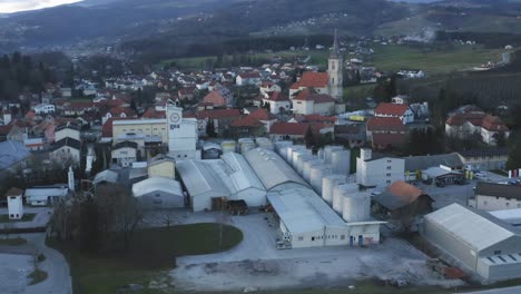 Industrial-area-in-small-town-in-Europe,-factory-in-urban-area-of-Slovenska-Bistrica,-Gea-Oil-Factory,-aerial-view-of-oil-mill-and-food-industry