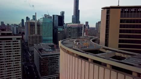 Aerial-Reveal---Crowded-Downtown-Big-City-with-Tall-Office-Buildings