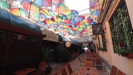 Hidden-cafes-and-restaurants-of-colorful-Umbrella-Alley-in-Bucharest,-Romania