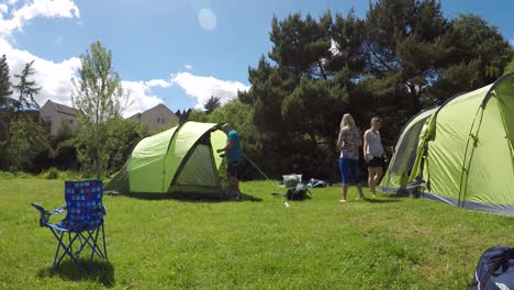 People-setting-up-tents-at-a-camp-in-Hidden-Valley