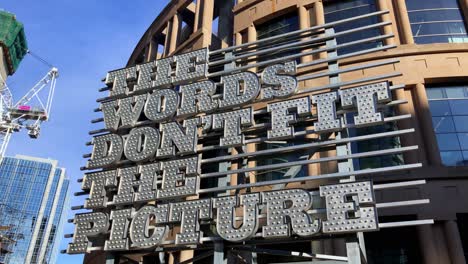 View-of-the-The-Words-Don't-Fit-The-Picture-sculpture-outside-the-Vancouver-public-library