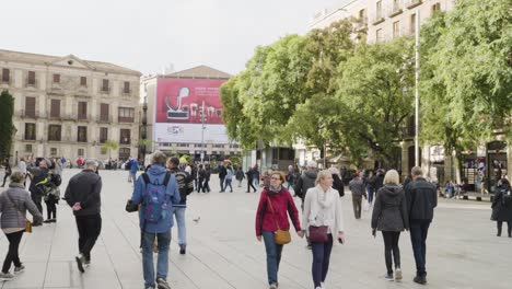 A-view-of-tourists-on-the-streets-of-Plaza-Catalunya-in-Barcelona,-Spain